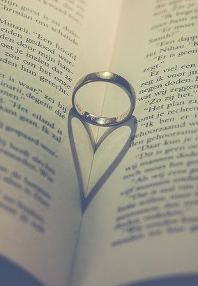 ring casting a shadow of a heart showing how love is at the center of marriage counseling